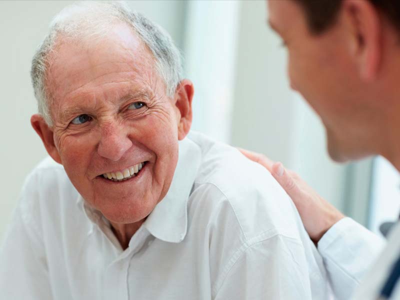 Older man with dementia getting treatment